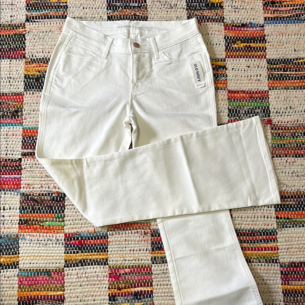 Mid rise white flared jeans
